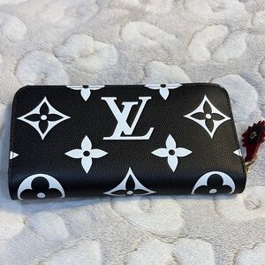 Monogram Black and White zippy wallet.
